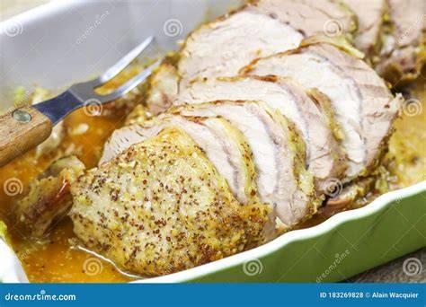 Filete de cerdo asado con mostaza