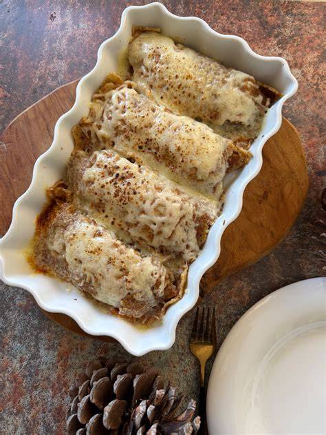 Crepes rellenos de champiñones gratinados