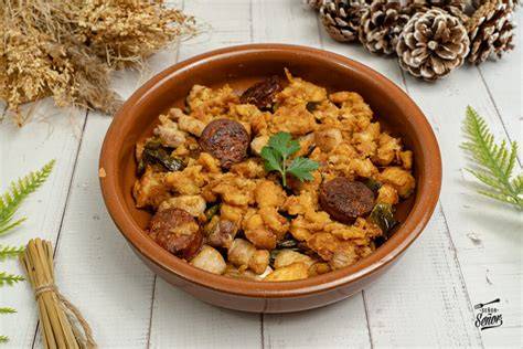 Plato de migas extremeñas con ajo tostado