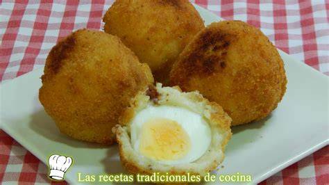 Proceso de rebozado de los huevos con bechamel