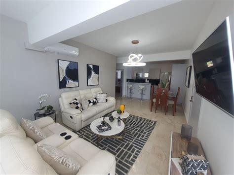 Interior de un apartamento amueblado con cocina y sala de estar