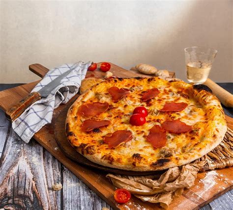 Plato de pizza en el restaurante Dulcinea