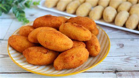 Masa de croquetas enfriándose en un recipiente