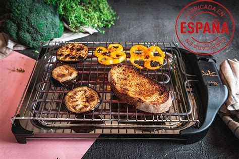 Infografía comparativa entre barbacoa eléctrica y barbacoa de carbón