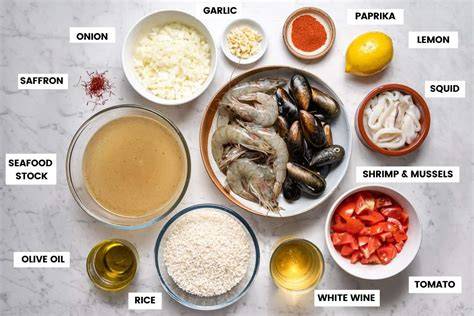 Tabla de ingredientes para paella de mariscos