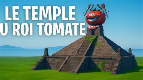 Jugador bailando junto a un Templo Tomate encendido en Fortnite