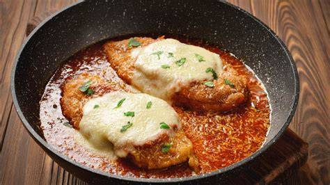 Pollo parmesano con jamón serrano