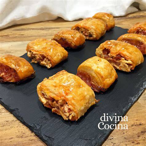 Bocaditos de hojaldre rellenos de nata y trufa