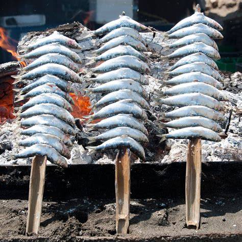 Sardinas a la brasa en espeto