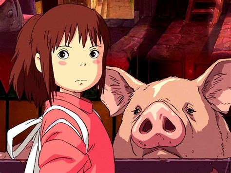 Chihiro y sus padres transformados en cerdos