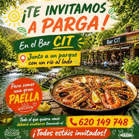 Mesa decorada con una paella central y ambiente festivo