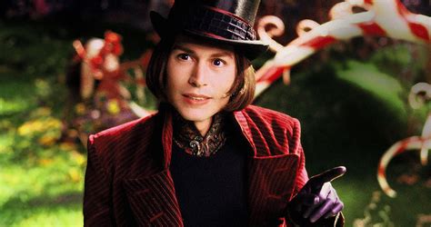 Willy Wonka recibiendo a los niños y sus padres en la entrada de la fábrica