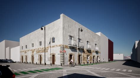 Fachada clásica de cafetería tradicional en el centro histórico de Málaga junto al mercado