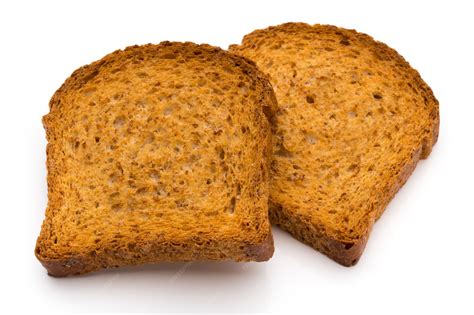 Rodajas de pan tostado en bandeja de horno