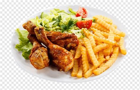 Plato de pollo frito con papas fritas y ensalada
