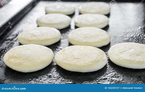 Arepas crudas antes de cocinar