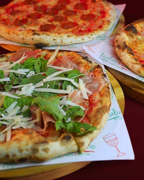 Variedad de pizzas artesanales en Pizza May