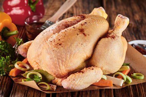 Pollo entero sazonado con especias