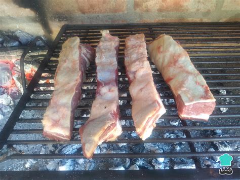 Parrilla con asado de tira
