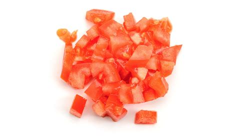 Tomate troceado en el robot de cocina