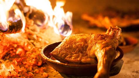 Lechazo asado en horno de leña