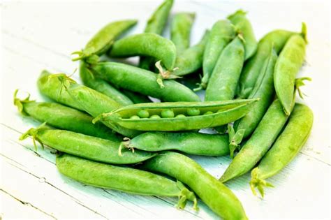 Guisantes frescos en su vaina