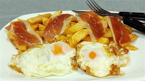 Huevos fritos con patatas y jamón ibérico