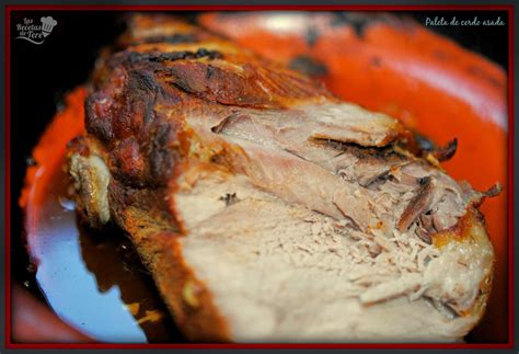 Plato de paleta de cerdo al horno con grelos y patatas