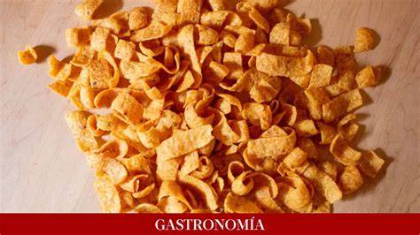 Mezclando pasta con especias para doritos bits