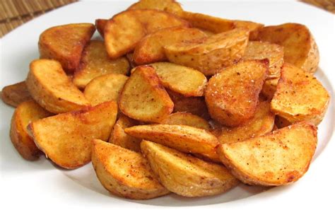 Patatas cortadas en gajos con hierbas aromáticas