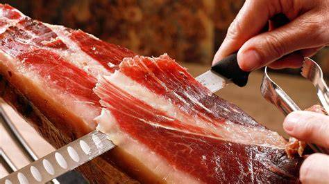 Formas de cubrir el jamón abierto con grasa y film