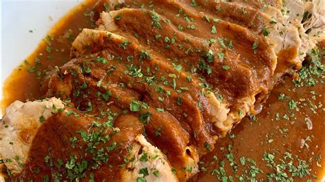 Olla a presión con lomo de cerdo cocinándose