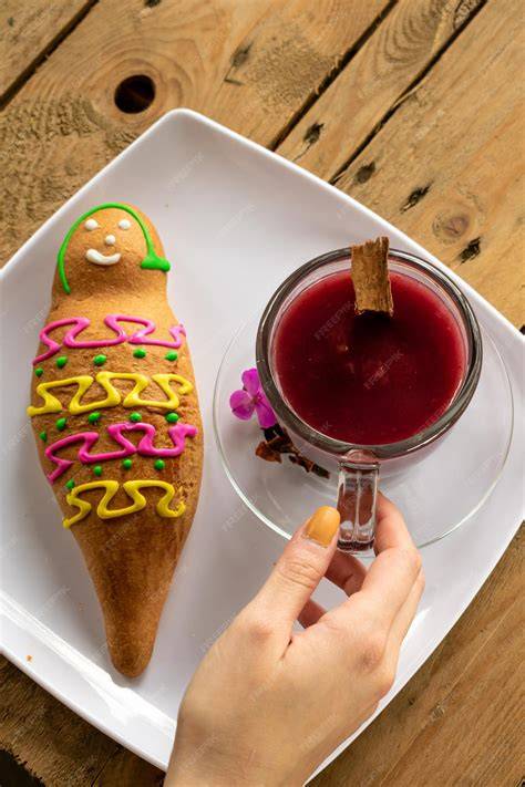 Plato típico ecuatoriano: Colada Morada con Guaguas de Pan