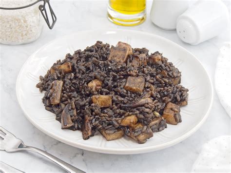 Arroz negro con calabaza y granada