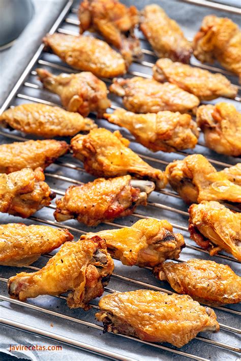 proceso de horneado de alitas de pollo doradas
