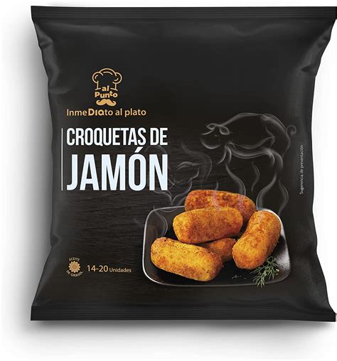 Croquetas congeladas en un recipiente listas para guardar
