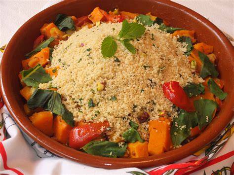 Tajine de calabaza con cuscús y granada