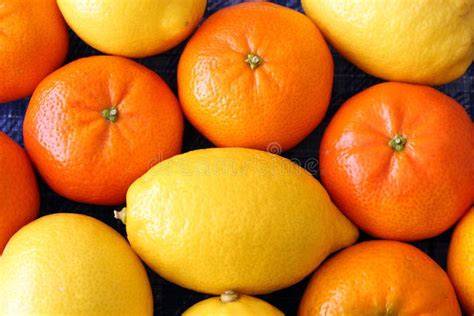 Zanahorias, naranjas y limones frescos