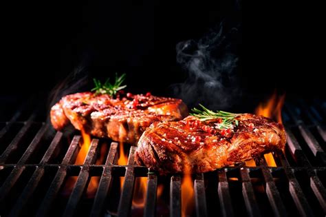 Imagen de una parrilla con carne asándose