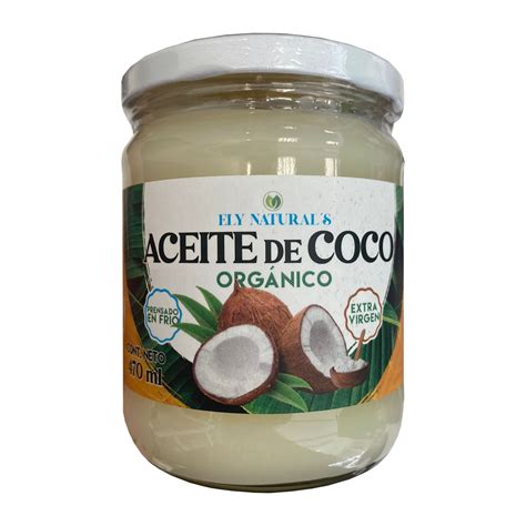 Aceite de coco orgánico en un tarro de cristal junto a ingredientes naturales