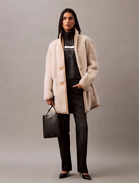 Chaquetas de shearling para mujer en camel y negro