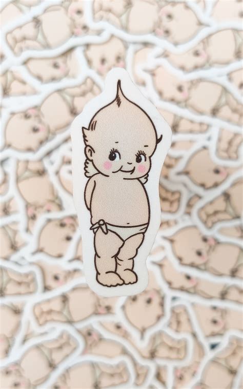 Logotipo de Kewpie con el bebé querubín
