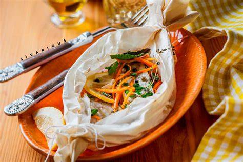 Imagen de un plato terminado de pescado con verduras frescas al papillote