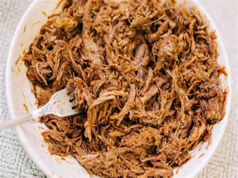 Cerdo desmenuzado en salsa Sichuan con cebollín