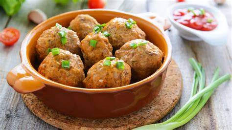 Albóndigas de calabacín friéndose