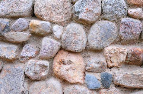 Muro de piedra natural deteriorado