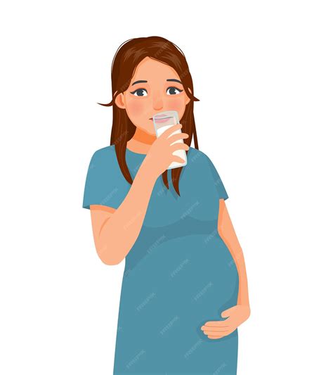 Mujer embarazada bebiendo un vaso de leche