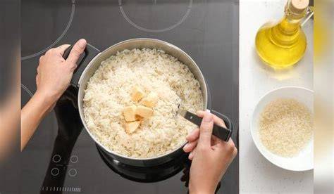 Aceite o mantequilla para el toque final del arroz graneado
