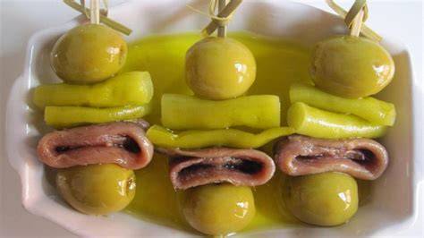 Gilda con mejillón, aceituna y mandarina