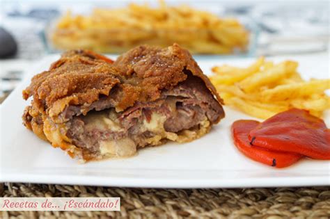 Cachopo de ternera con patatas y pimientos